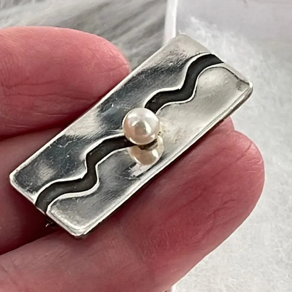 1987 sterling silver and pearl E.J.Walters brooch.